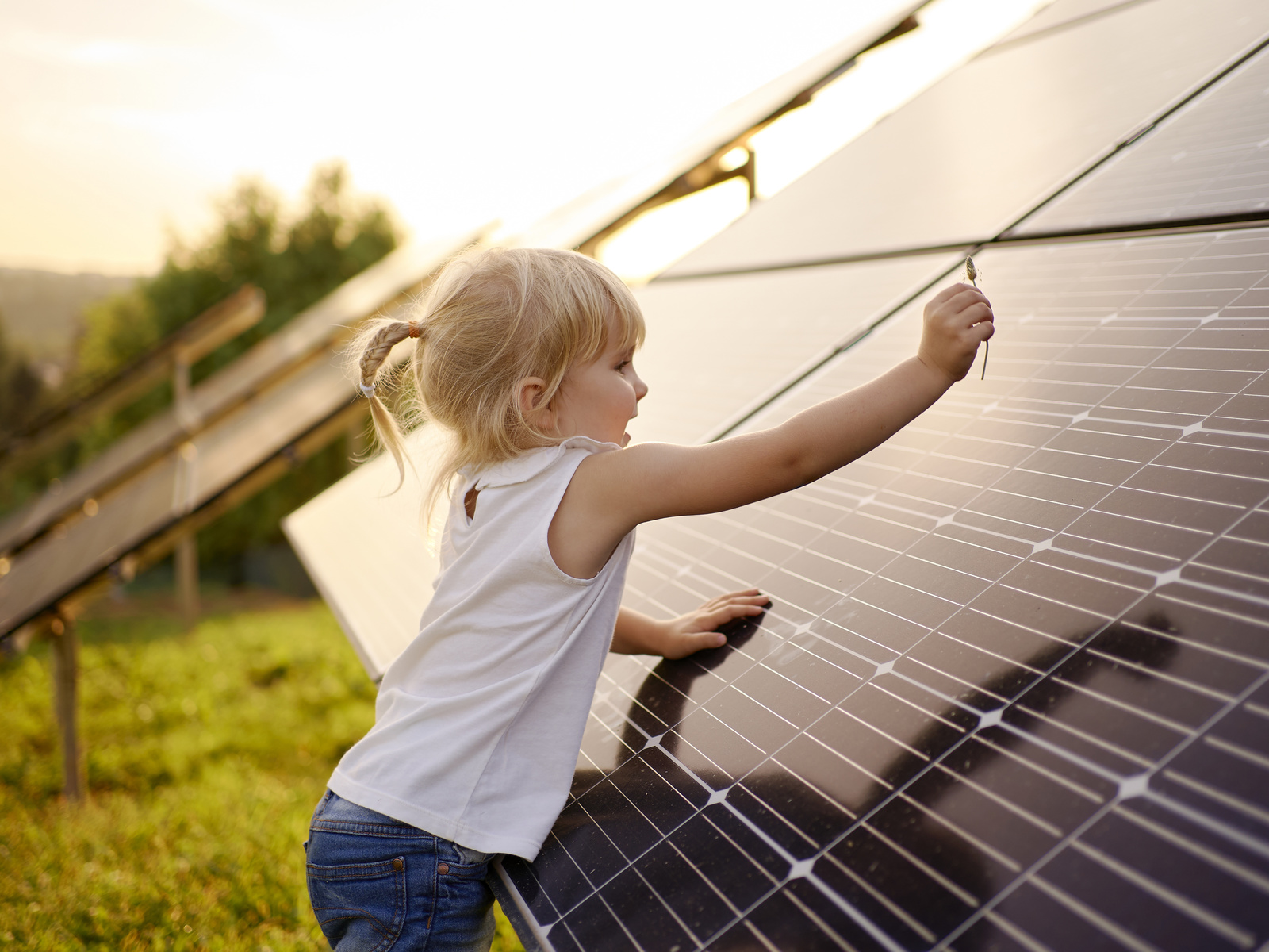 young girl, sunset, solar panel