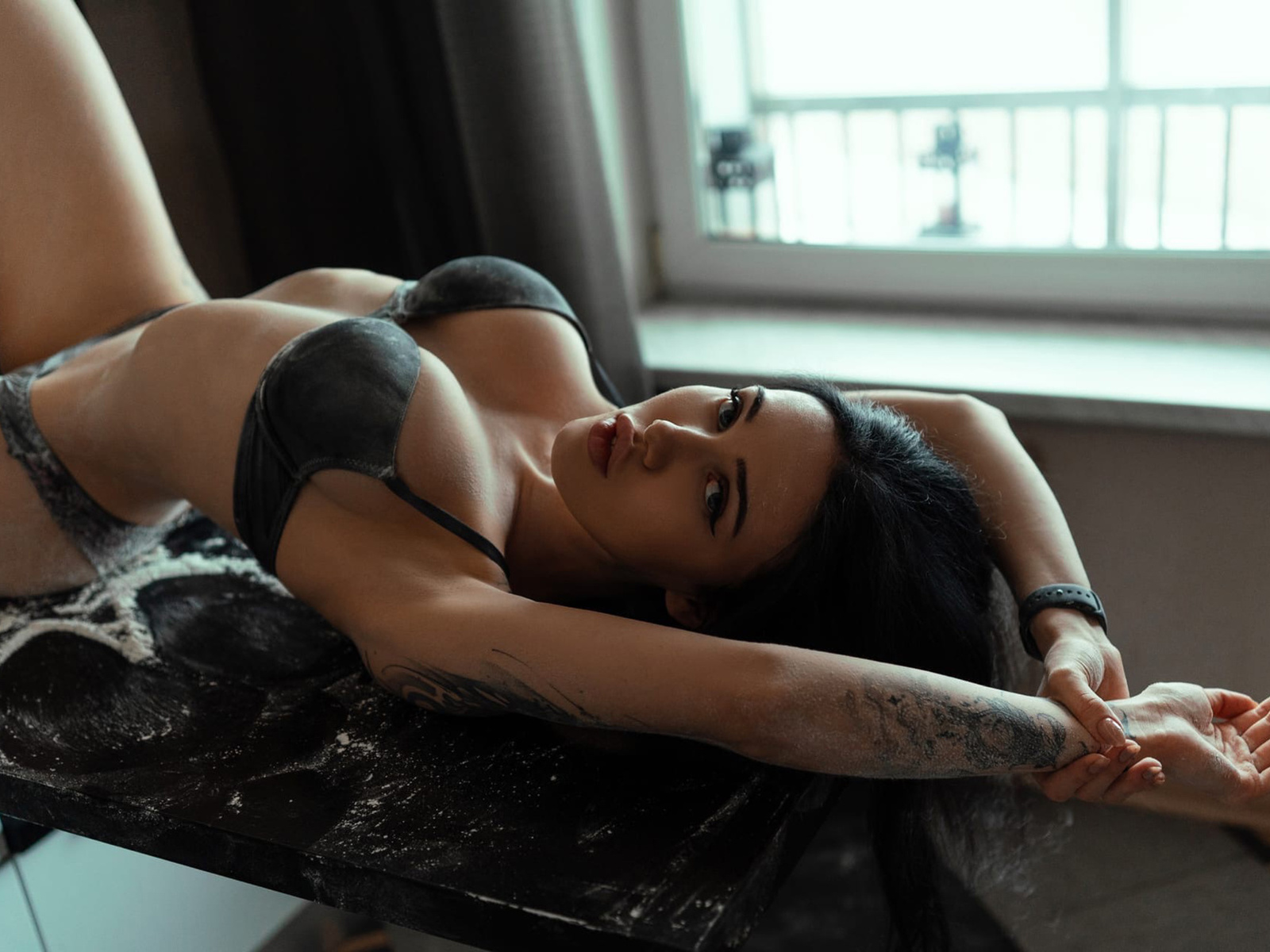 women, brunette, model, women indoors, kitchen, black lingerie, lingerie, black panties, black bra, hips, ass, boobs, window, table, flour, tattoo