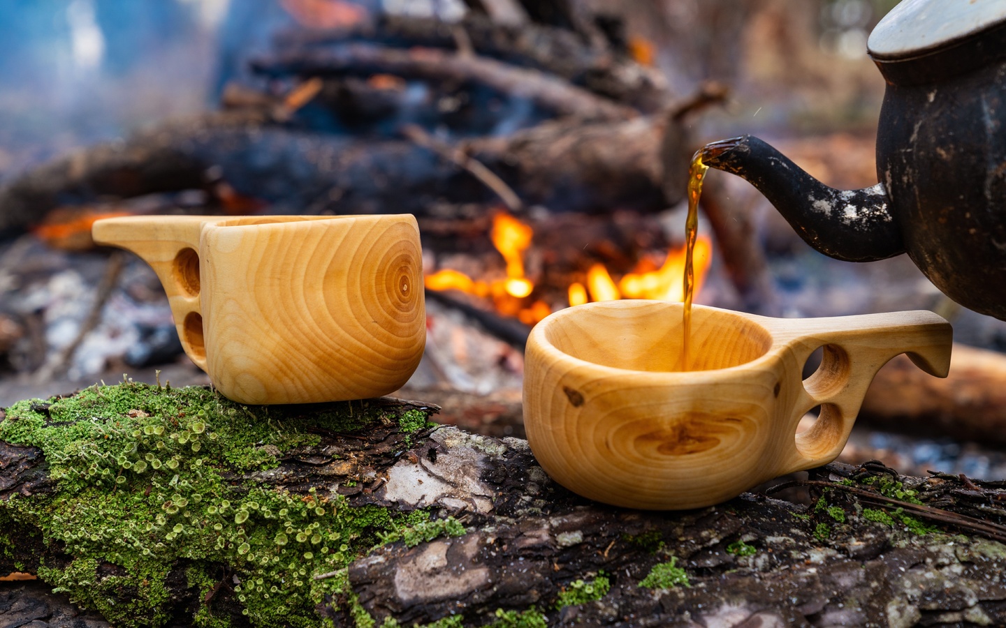 wooden finnish mug, camp fire, coffee