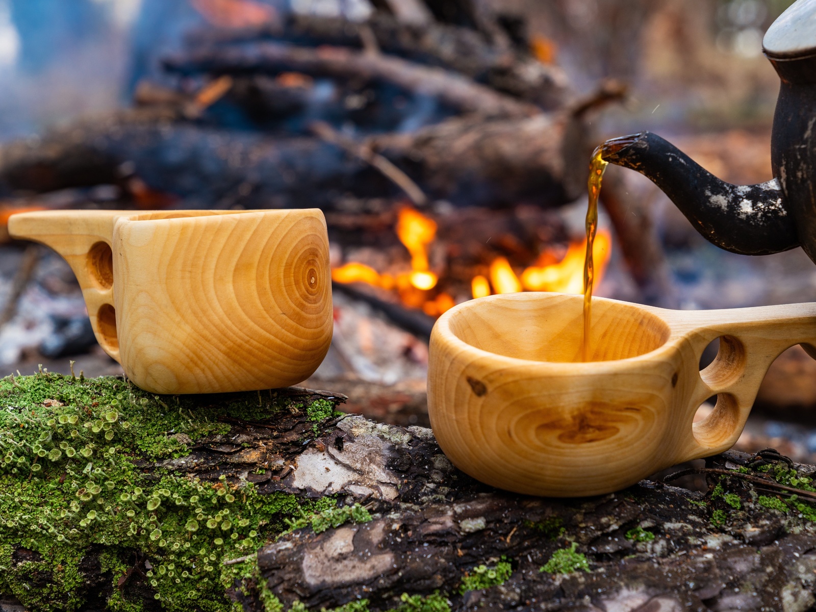 wooden finnish mug, camp fire, coffee