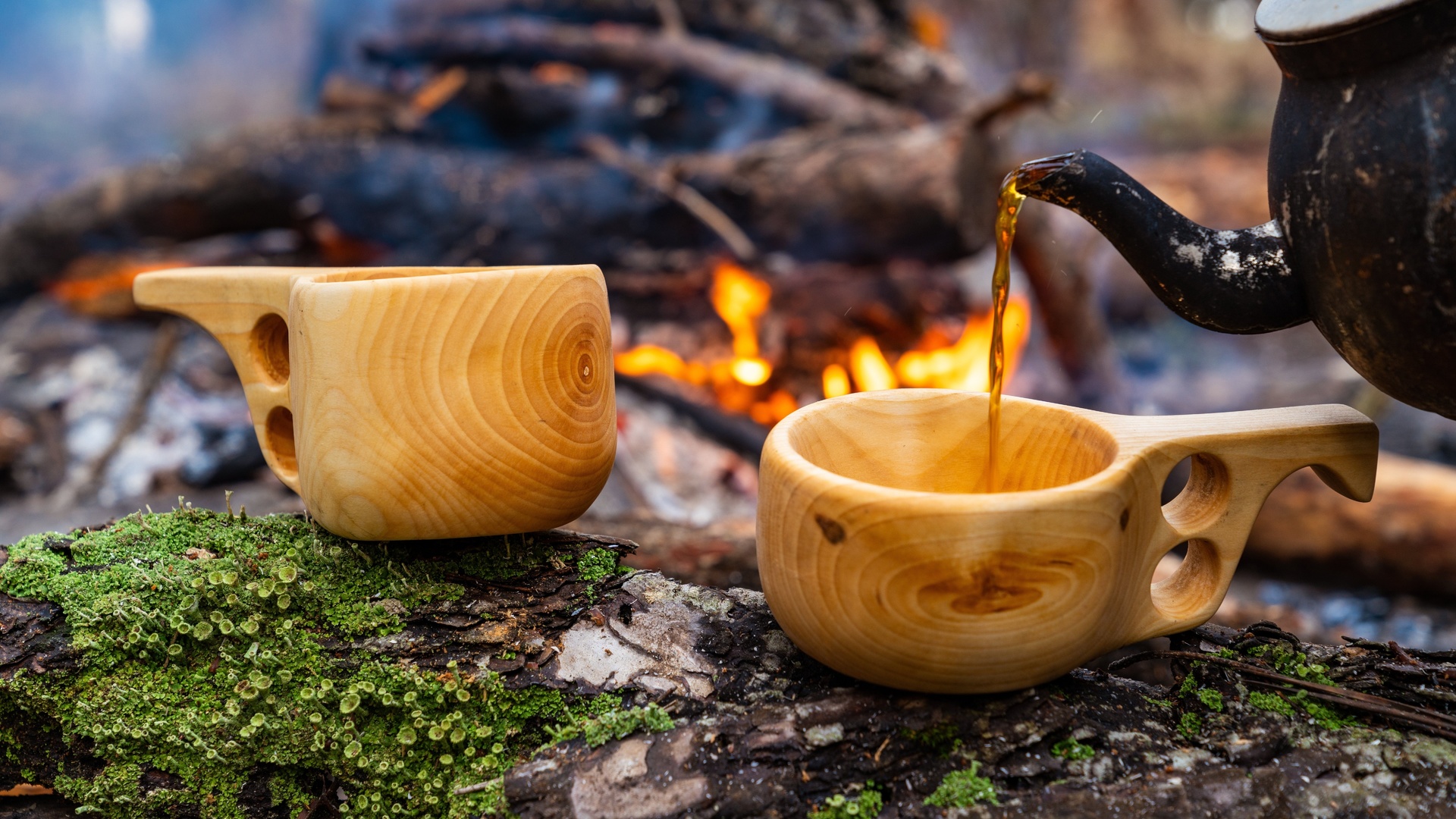 wooden finnish mug, camp fire, coffee