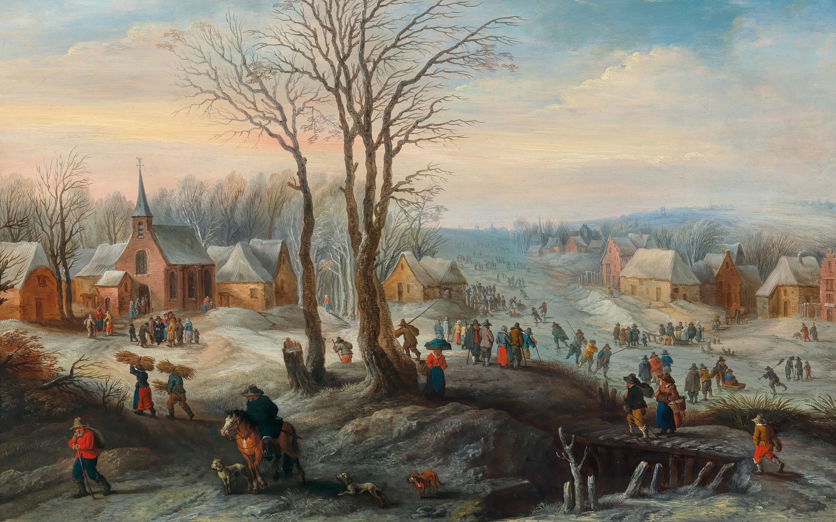 karel beschey, flemish, a winter landscape with numerous figures in a village