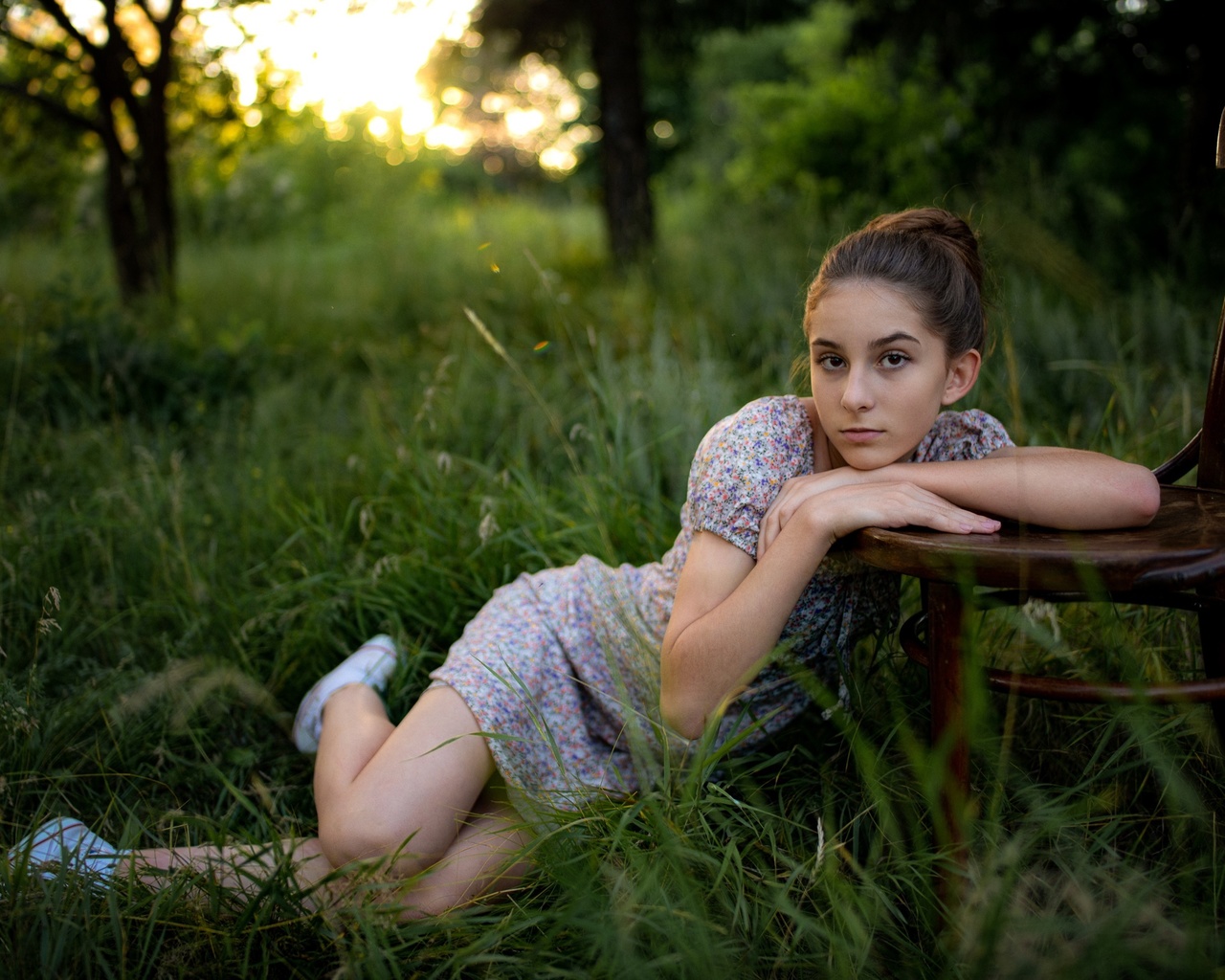 model, brunette, women, women outdoors, grass, trees, nature, dress, summer dress, flowered dress, chair, converse, sneakers