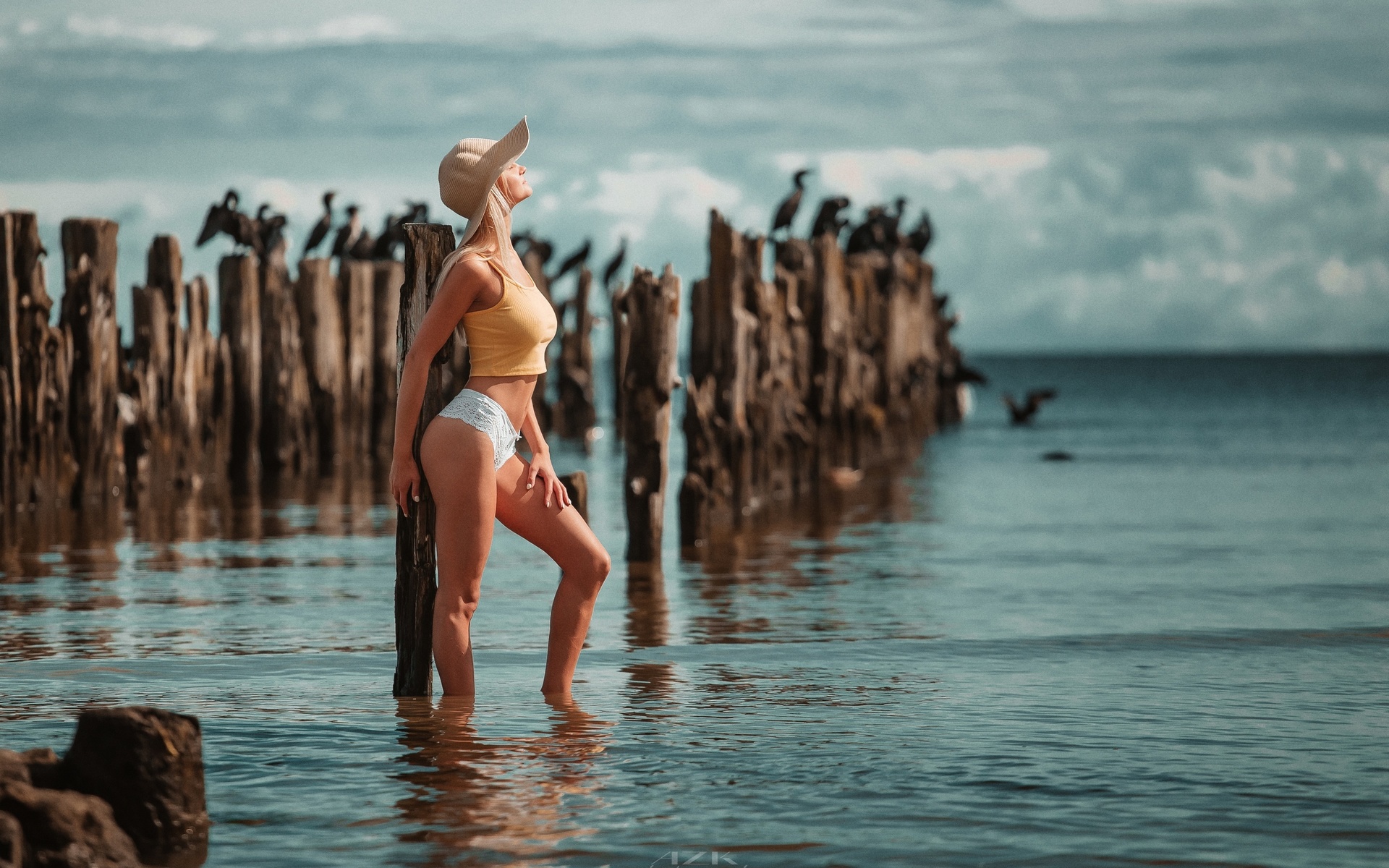 women, blonde, model, women outdoors, beach, sea, white panties, sky clouds, baseball cap, cap, short tops, t-shirt