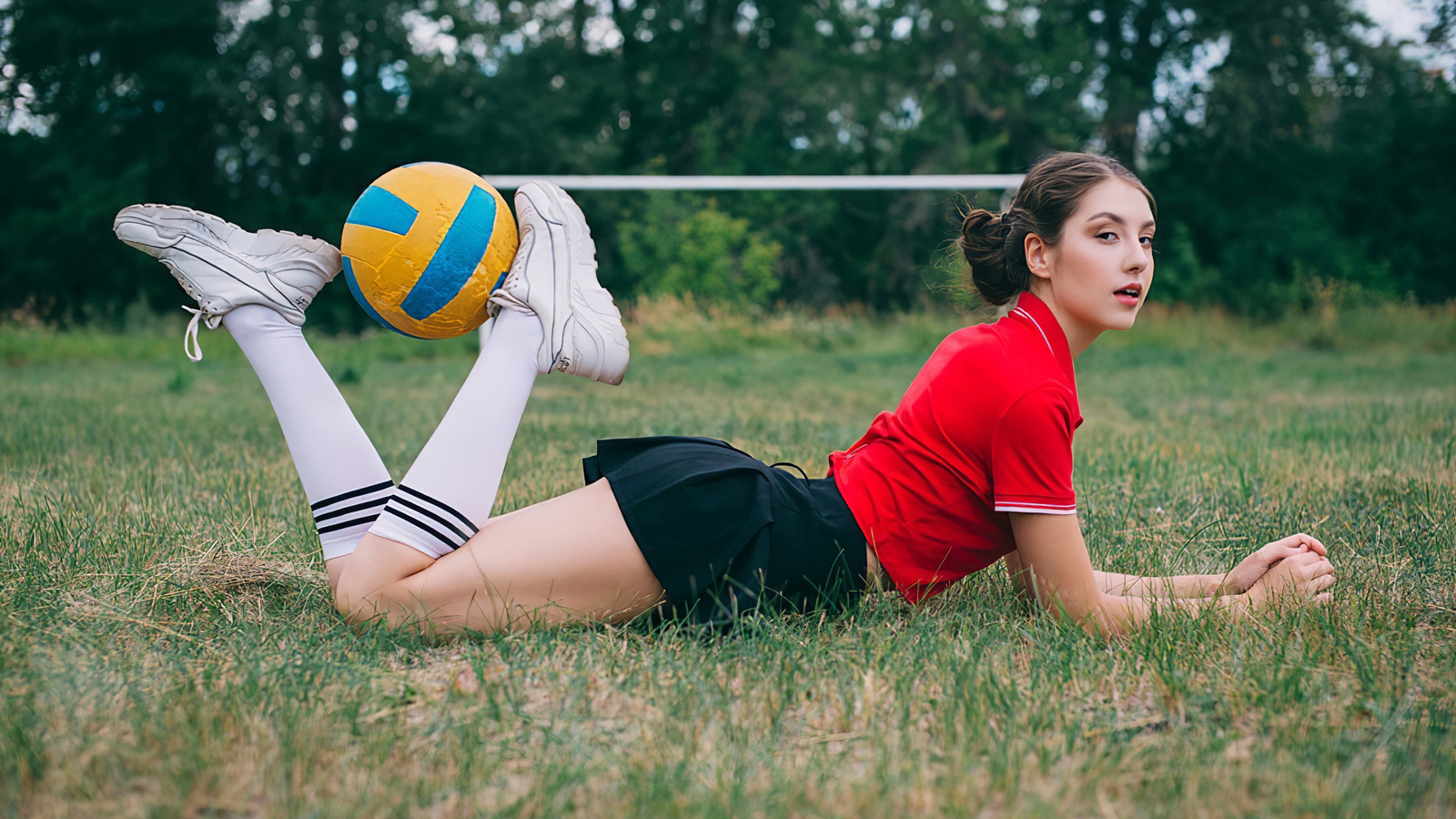 women, model, brunette, women outdoors, sneakers, t-shirt, miniskirt, grass, trees, goal, soccer ball