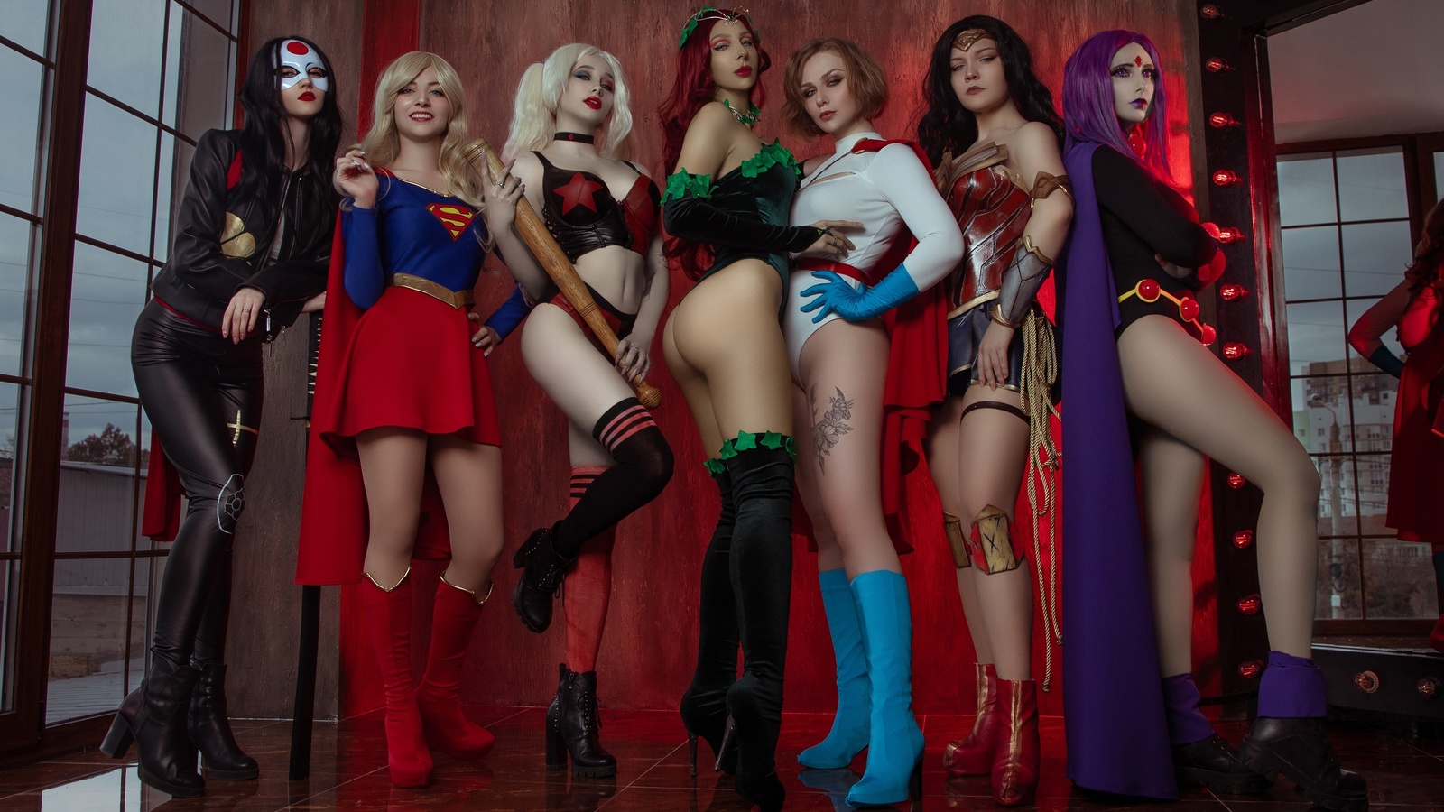 women, group of women, cosplay, blonde, redhead, mask, women indoors, tattoo, supergirl, harley quinn, poison ivy, power girl, wonder woman, raven, katana, ass, mirror, reflection, baseball bat, belly, high heels, shoes, knee-high boots, red lipstick