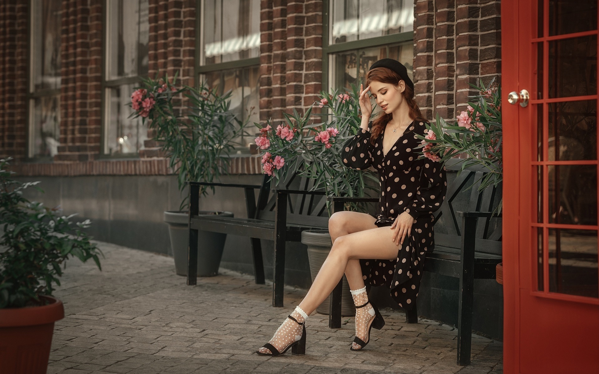 women, model, brunette, women outdoors, polka dots, dress, black dress, flowers, bench, legs