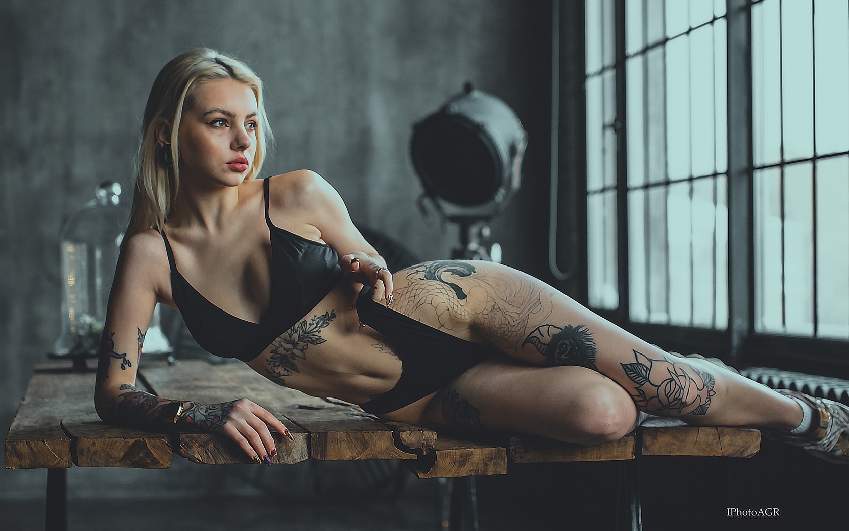 tattoo, women indoors, hips, women, model, blonde, on table, black lingerie, wooden table, black bra, black panties, lingerie, bra, panties