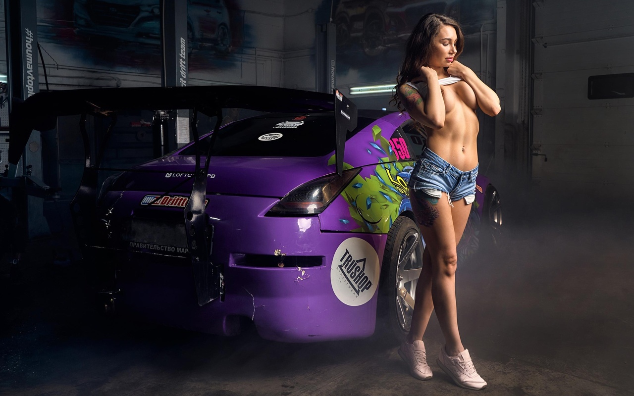 alexandra roz, brunette, women, model, anime car, car, purple cars, women indoors, boobs, covering boobs, jean shorts, tattoo, hips, tank top