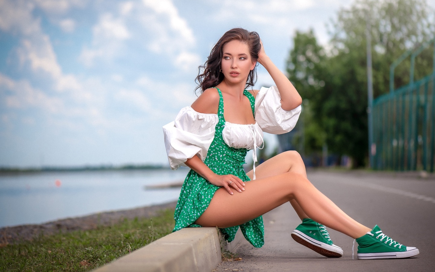 sergey gokk, women, model, brunette, women outdoors, sky, clouds, trees, sitting, converse, sneakers, green sneakers, lake, legs