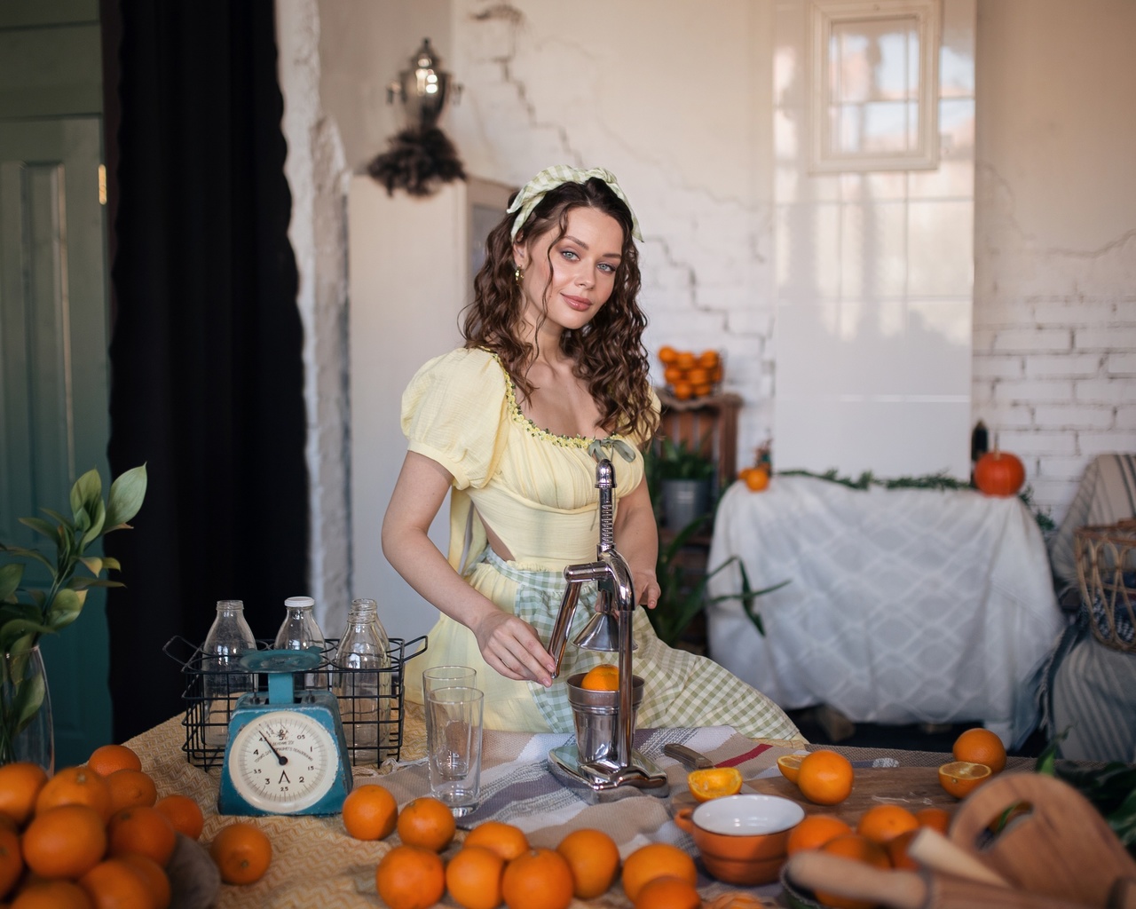 yellow dress, apron, table, women indoors, orange fruit, plants, brunette, women, model, looking at viewer, juice