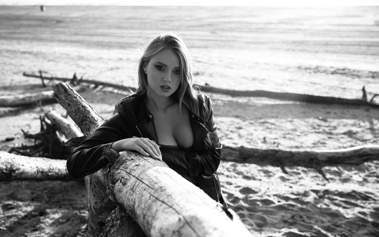 black jacket, leather jacket, women outdoors, blonde, model, women, neckline, beautiful, looking at viewer, beach, monochrome