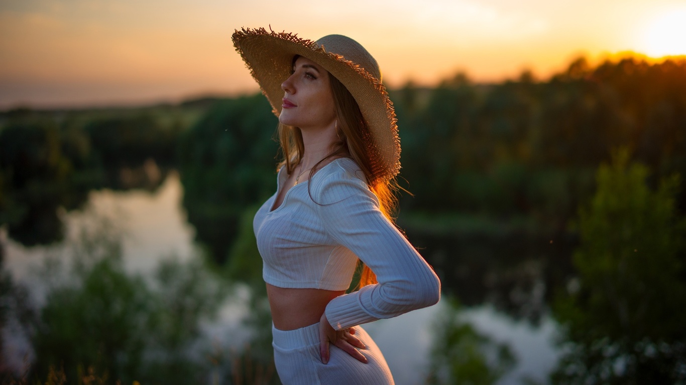 straw hat, women outdoors, nature, lake, sky, sunset, trees, women, brunette, model, hips, white clothing, white skirt