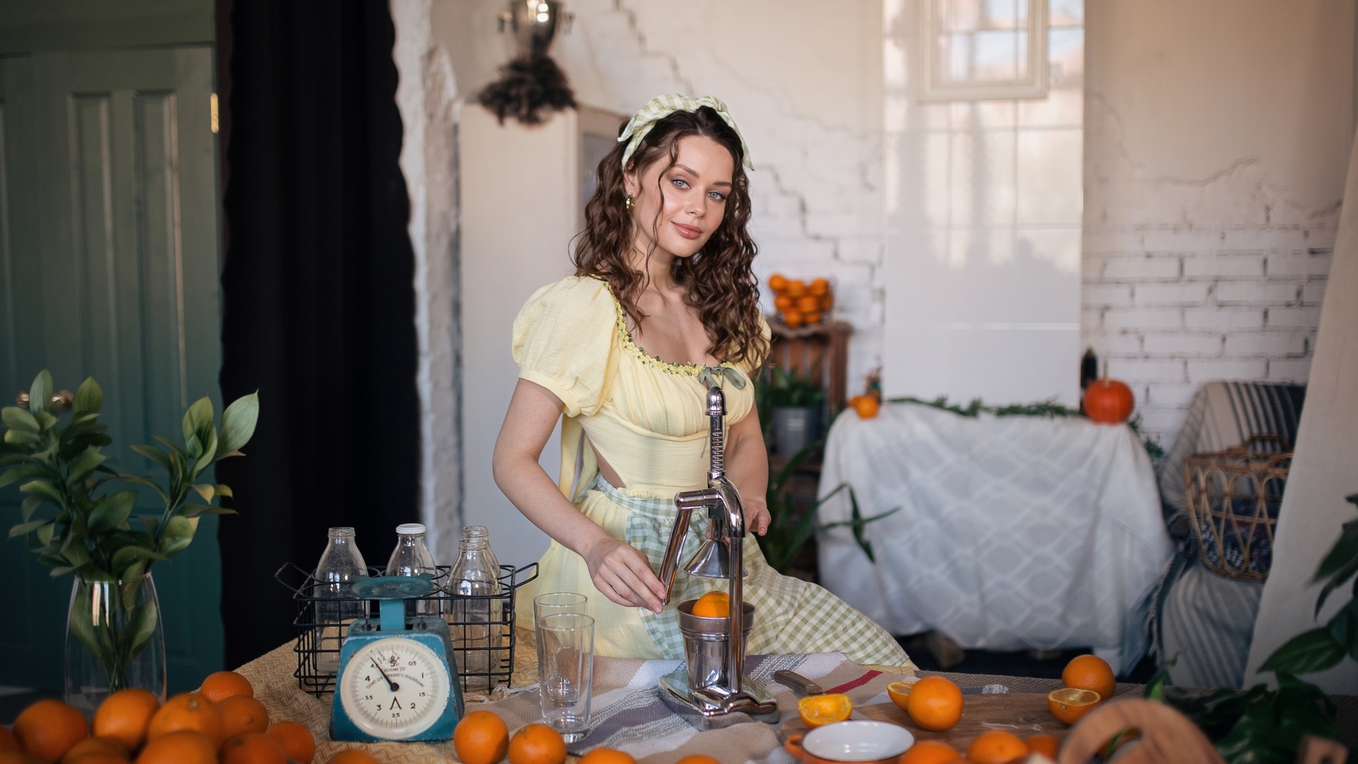 yellow dress, apron, table, women indoors, orange fruit, plants, brunette, women, model, looking at viewer, juice