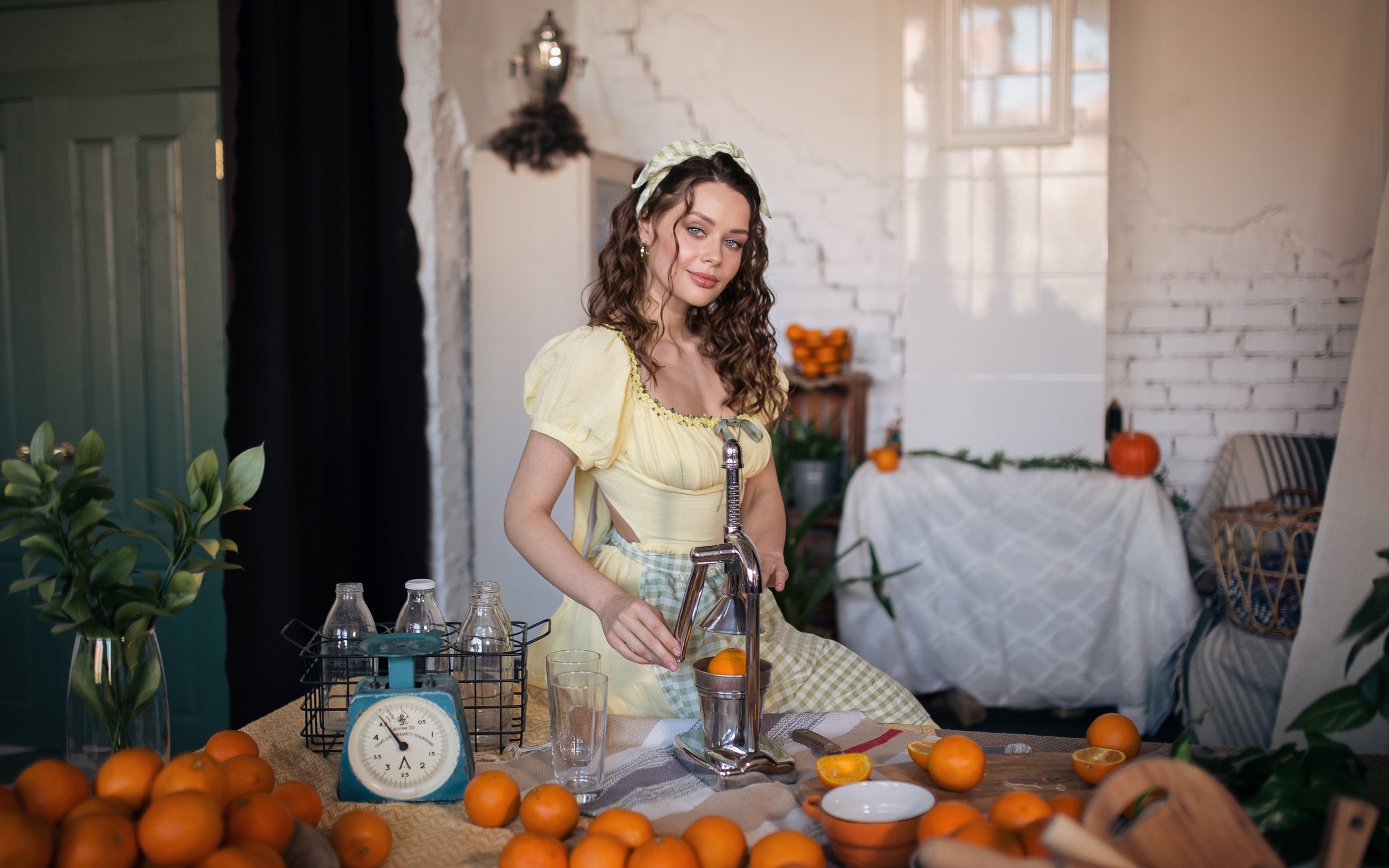 yellow dress, apron, table, women indoors, orange fruit, plants, brunette, women, model, looking at viewer, juice