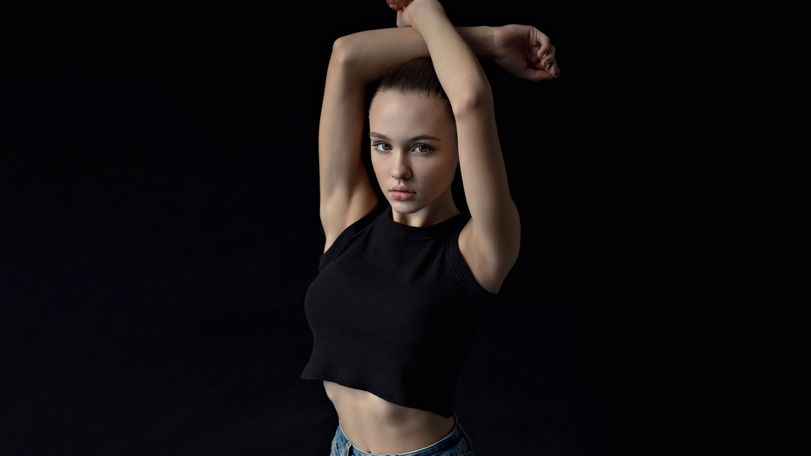 brunette, black top, women, model, jeans, women indoors, studio, girl, short tops, simple background, arms up, looking at viewer