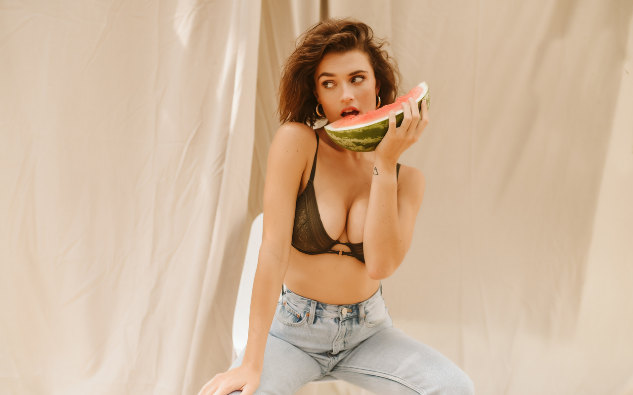 lacey rogers, women, model, brunette, black bra, chair, sitting, jeans, watermelon, tattoo