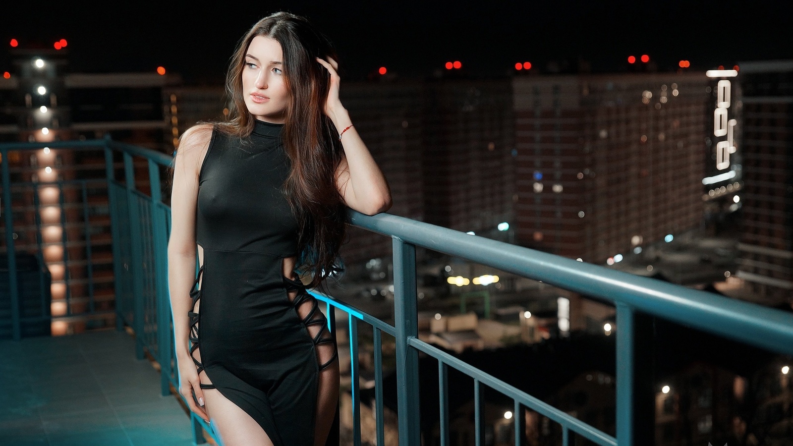 , maxim matveev, outdoors, brunette, city, hips, black dress, model, night, balcony, railing