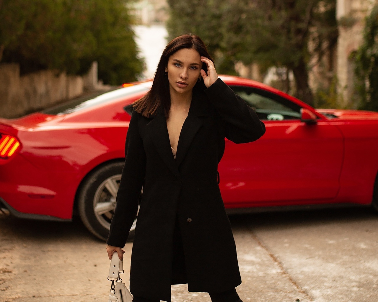 red cars, model, , coats, women outdoors, brunette, women with cars, black coat, trees, looking at viewer