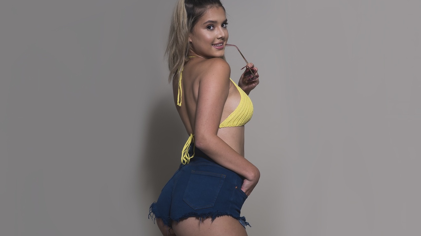 model, simple background, long hair, ass, photography, dress, smiling, jean shorts, black hair, fashion, hair, lingerie, bikini top, swimwear, clothing, supermodel, girl, beauty, hand, leg, muscle, blond, hairstyle, photo shoot, brown hair, art model, abd