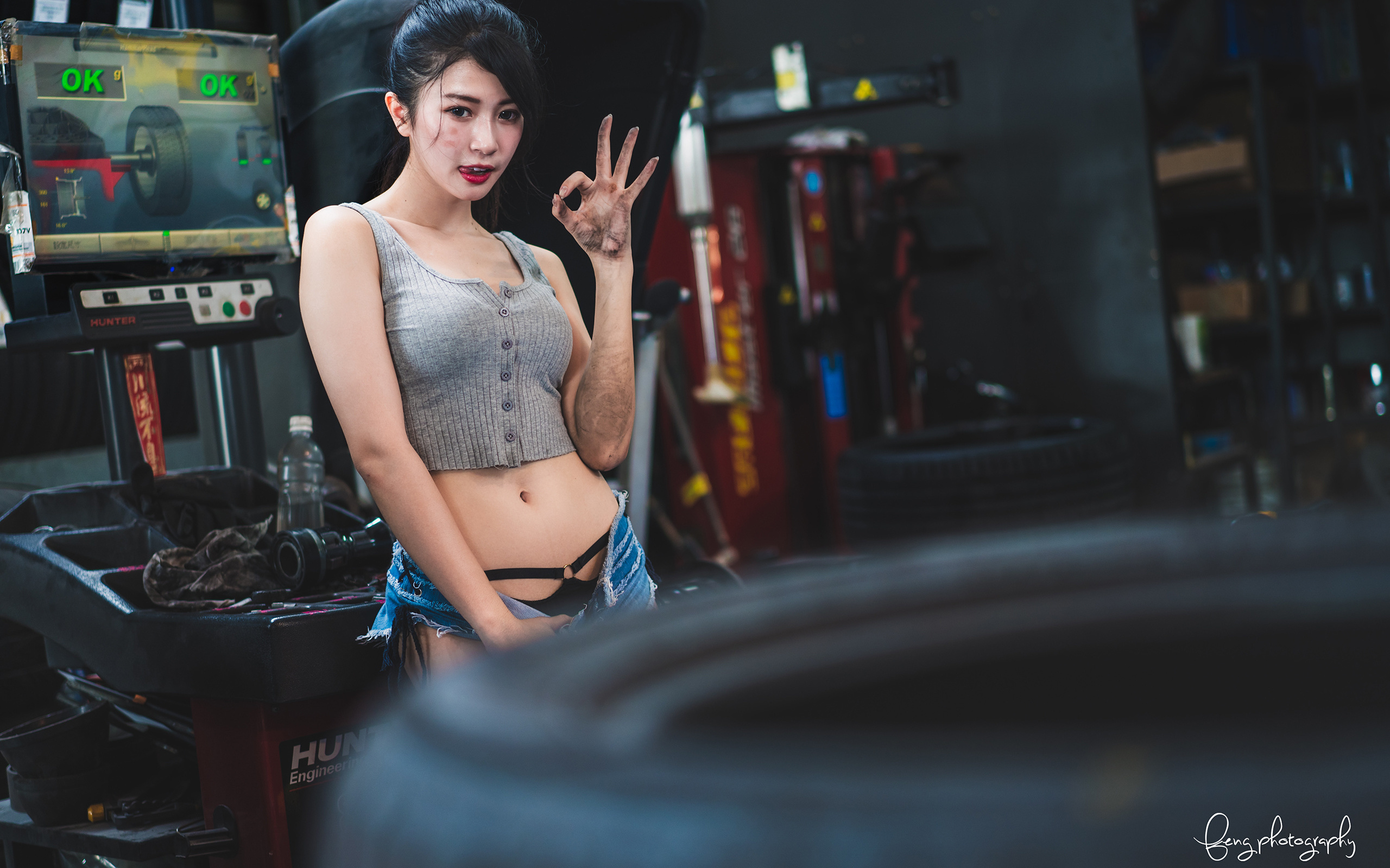 asian, brunette, women indoors, jean shorts, short tops, , red lipstick, belly button, model, workshop, black panties