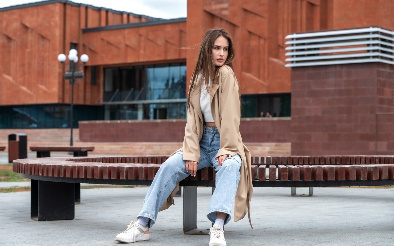 jeans, white tops, brunette, sitting, public, , women outdoors, model, sneakers, urban, trench coat