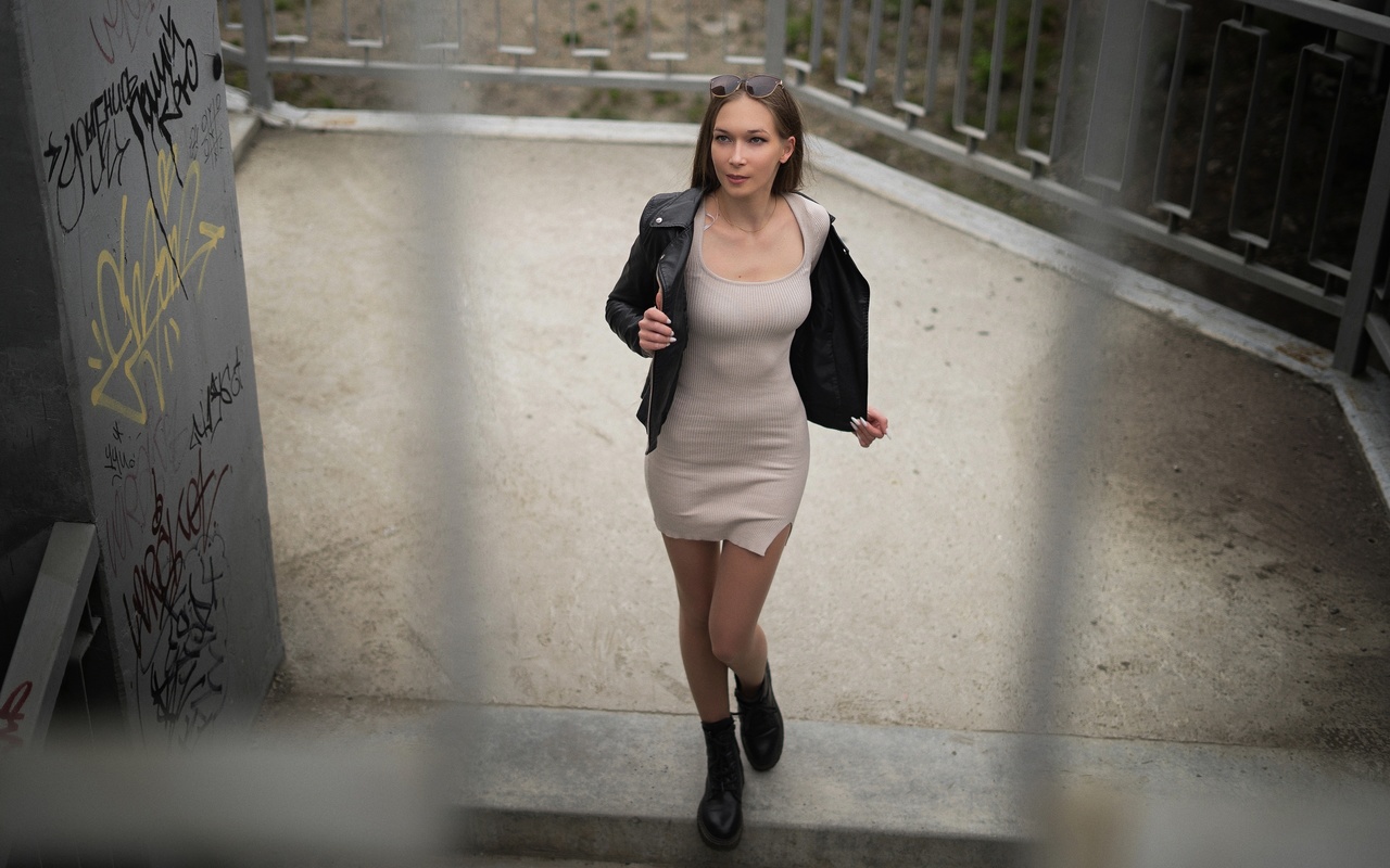 robert zazin, public, model, women outdoors, leather jacket, white dress, , brunette, urban, sunglasses, boots