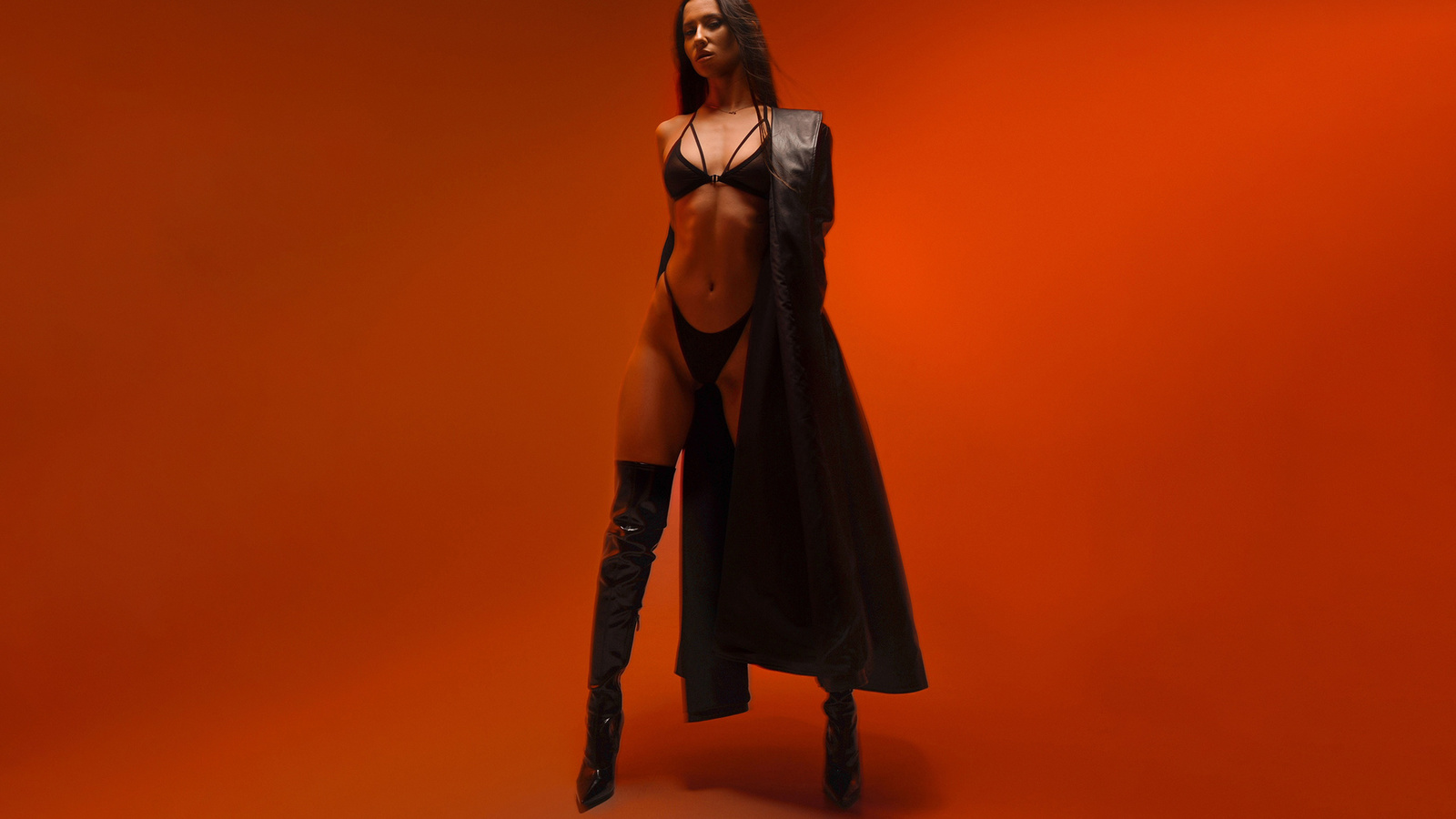 yury semenov, studio, black lingerie, black panties, women indoors, brunette, , ass, trench coat, model, hips, orange background, belly button, black bras