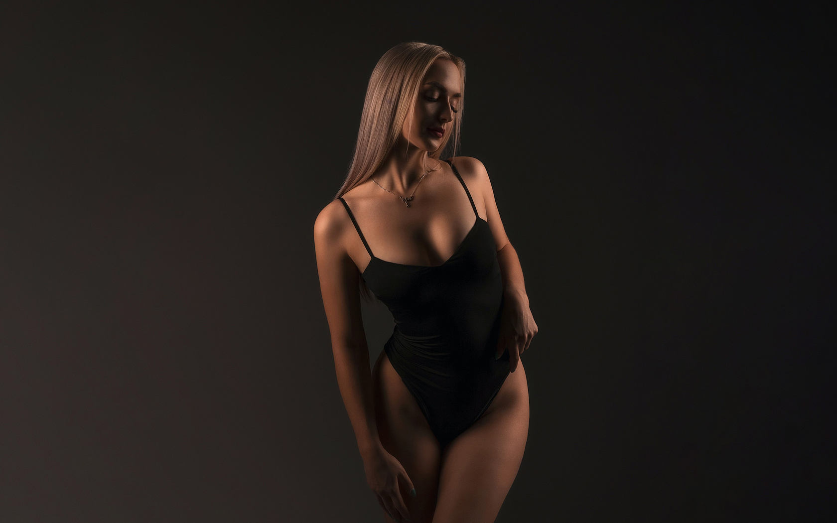 black bodysuit, hips, studio, blonde, , women indoors, model, standing