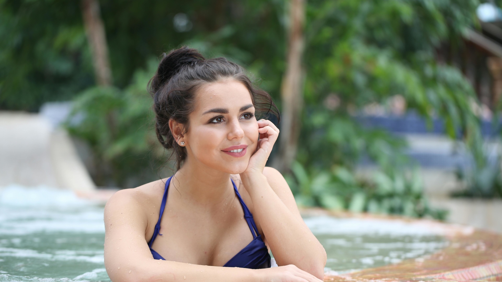 woman, in blue bikini, top, in water