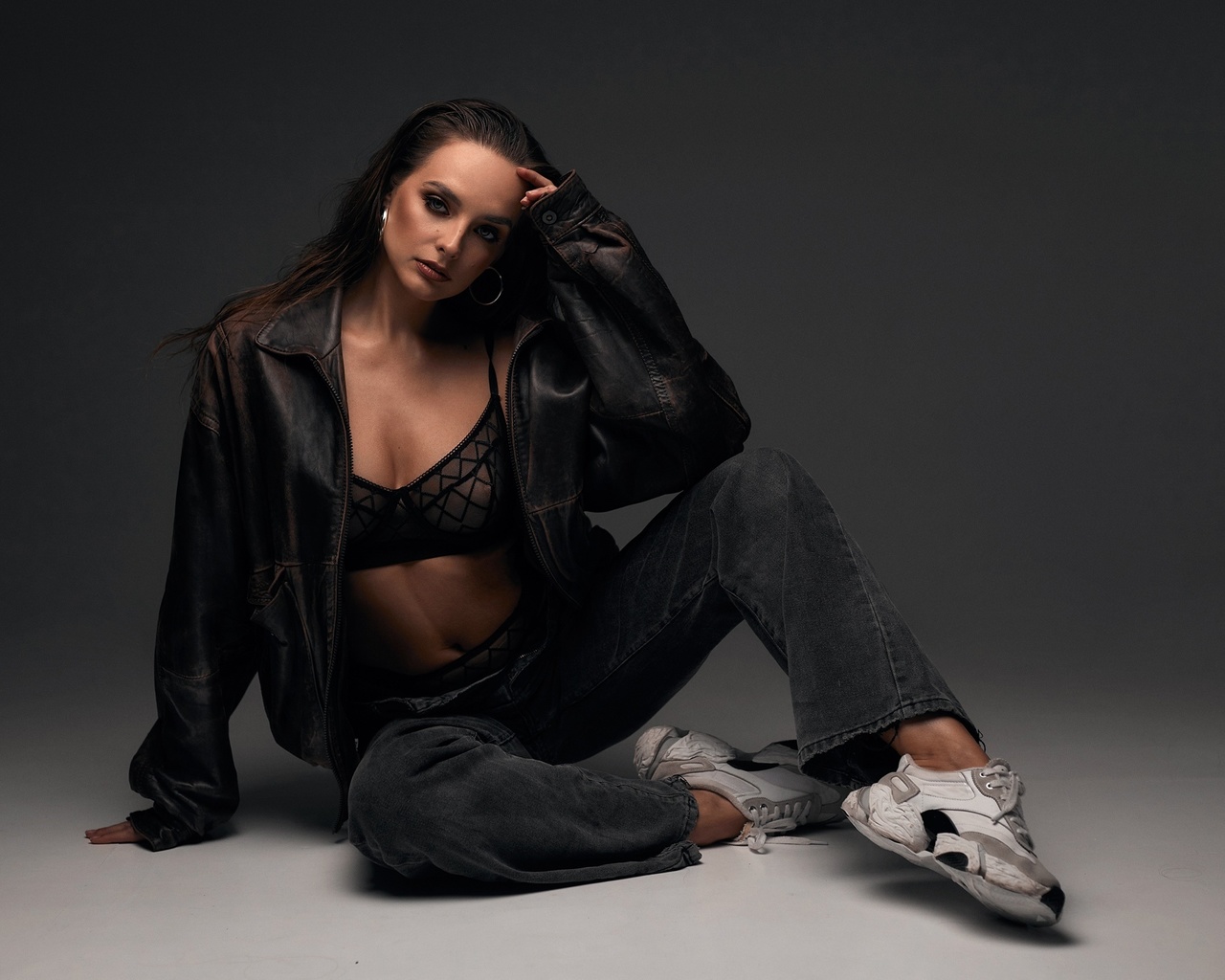 alexander skripnikov, women indoors, brunette, studio, black lingerie, , model, jeans, black bra, hips, jacket, belly button, open jeans, black panties, leather jacket, on the floor, sneakers