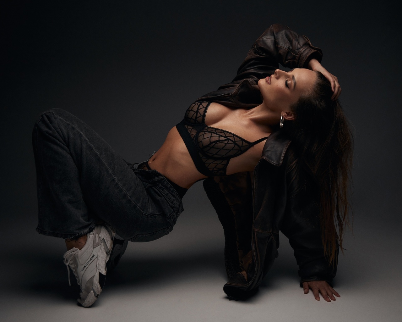 alexander skripnikov, women indoors, brunette, studio, black lingerie, , model, jeans, black bra, hips, jacket, belly button, open jeans, black panties, leather jacket, on the floor, sneakers