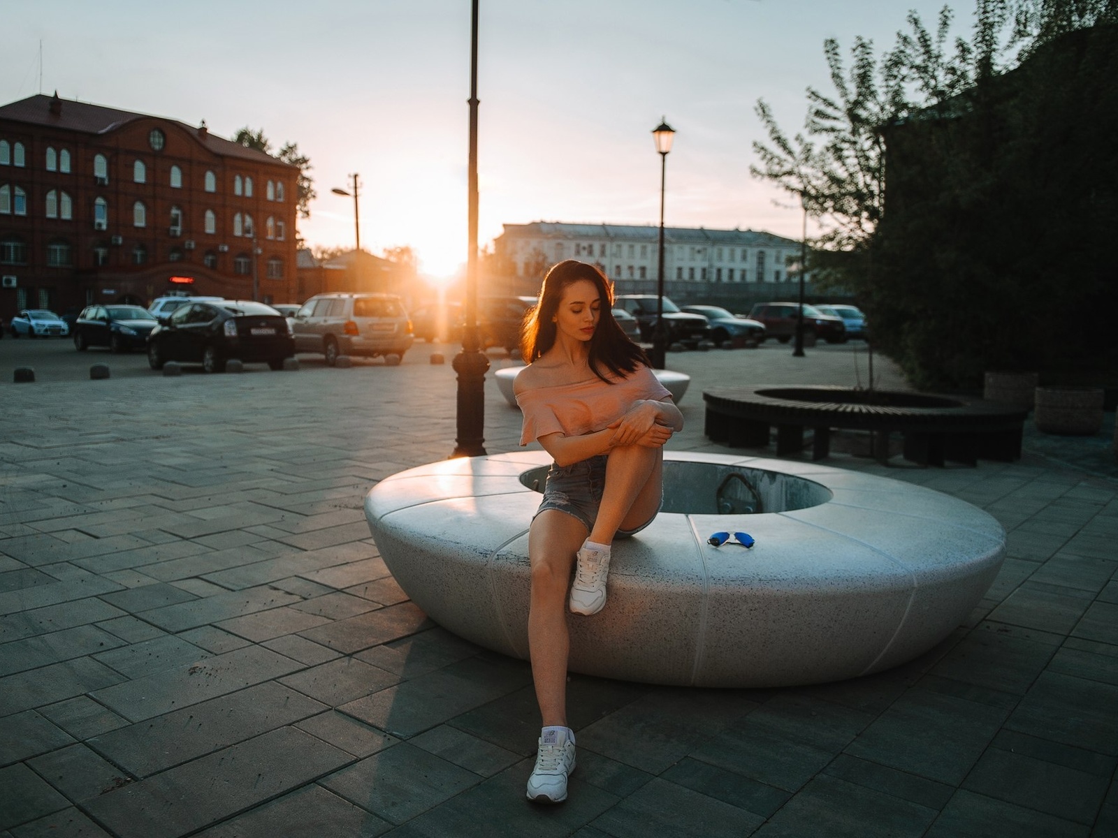 women, jean shorts, pink tops, women outdoors, public, redhead, urban, sitting, , car, model, red lipstick, sneakers, brunette, sky, sunglasses, sun, closed eyes