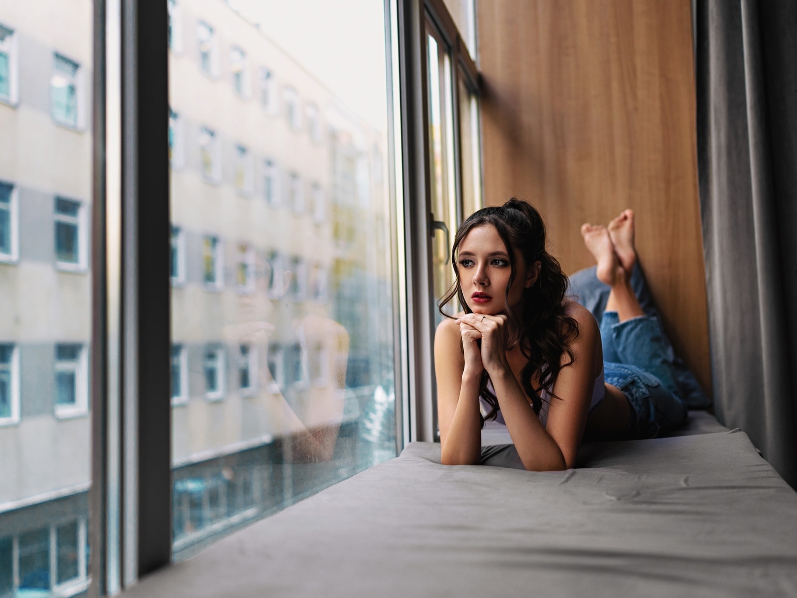 disha shemetova, jeans, by the window, white tops, tattoo, red lipstick, brunette, lying on front, , makeup, women indoors, looking out window, model