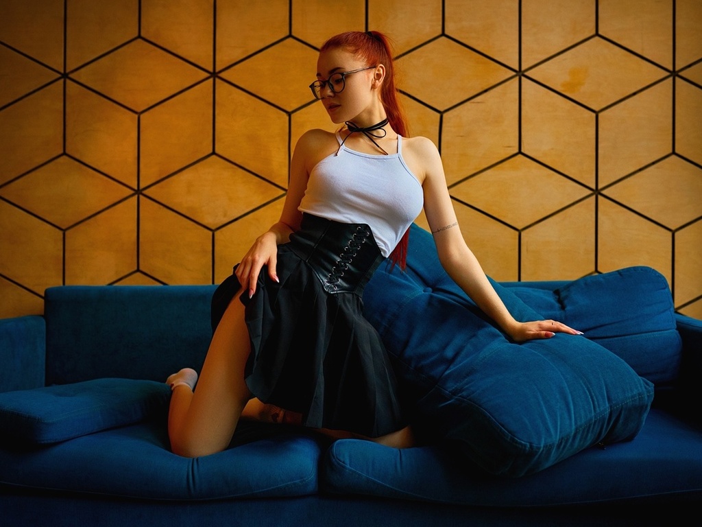 sergey bogatkov, redhead, miniskirt, black skirt, women indoors, women with glasses, , tattoo, nadezhda tretyakova, model, tank top, women, blue couch, kneeling