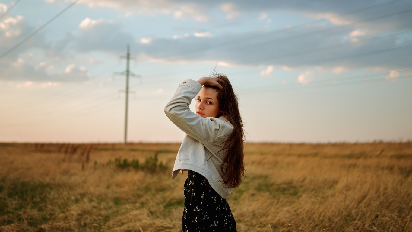 black dress, brunette, field, denim jacket, , grass, model, women outdoors, sky, clouds, long hair