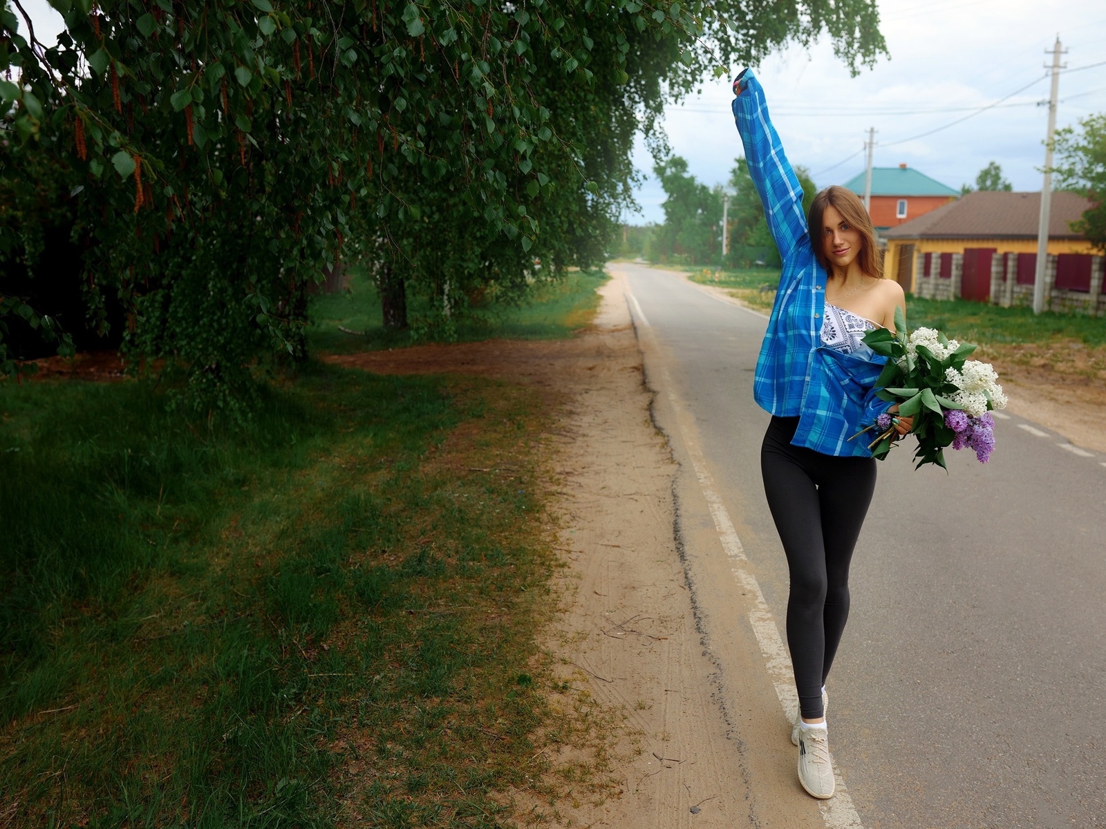 sergey bogatkov, , outdoors, leggings, brunette, model, road, trees, flowers, grass, sneakers, sky, clouds, plaid shirt, hips, blouse