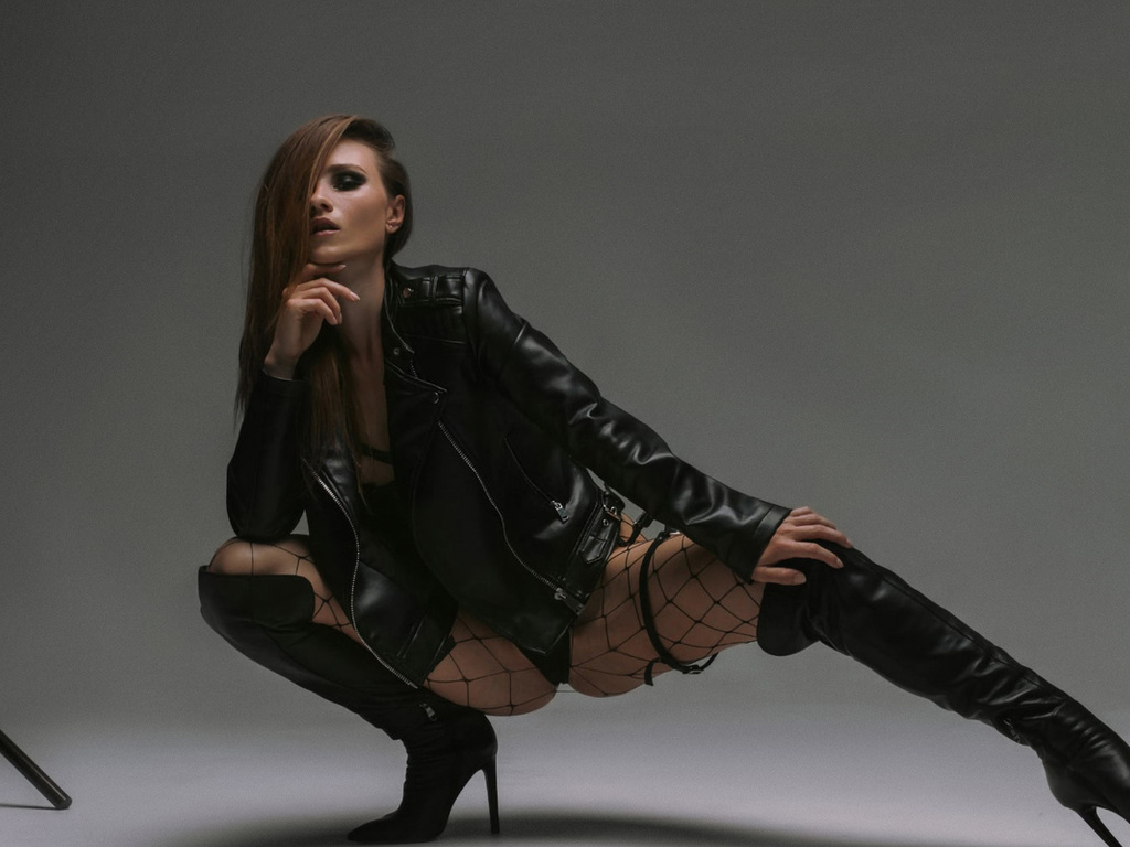 studio, ornella igoshina, bodysuit, , ass, squatting, leather jacket, brunette, boots, high heeled boots, women indoors, women, jacket, black bodysuit, model