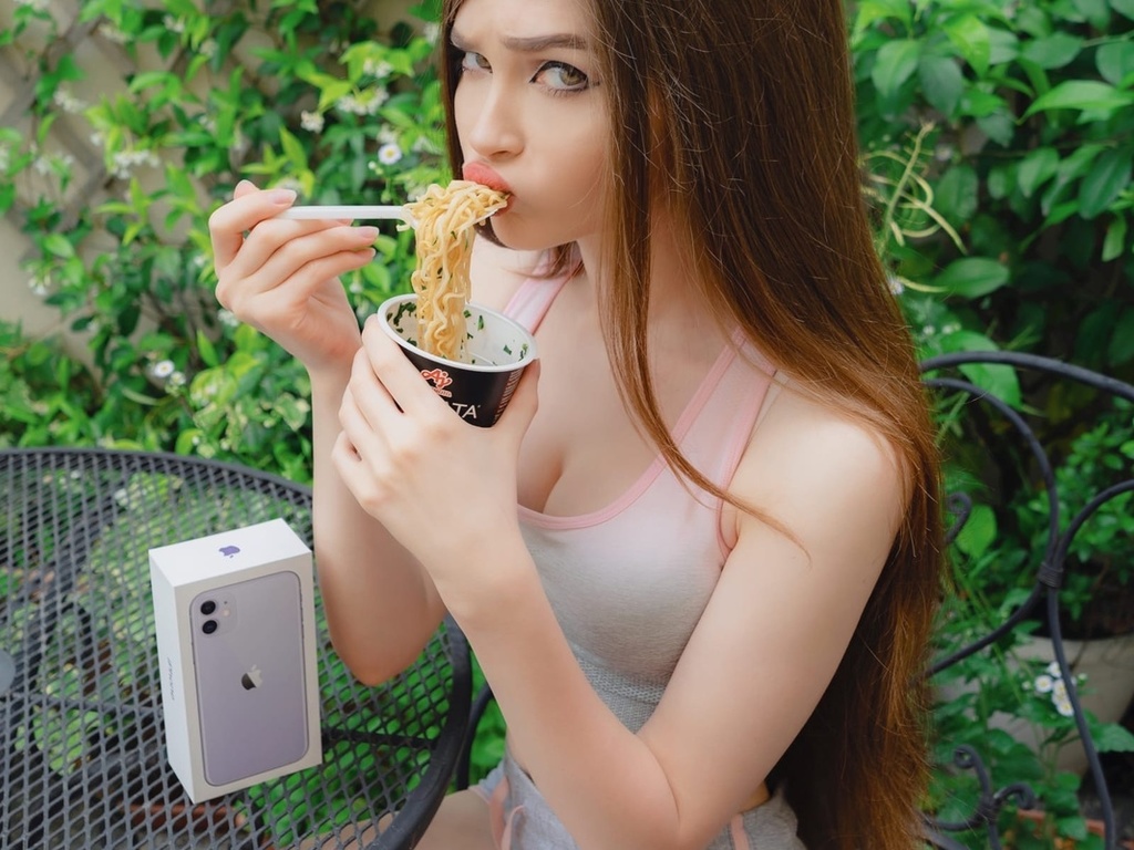 karina kozyreva, ramen, brunette, soup, , model, women outdoors, long hair, sitting, sportswear, legs crossed, shorts, eating, ramen