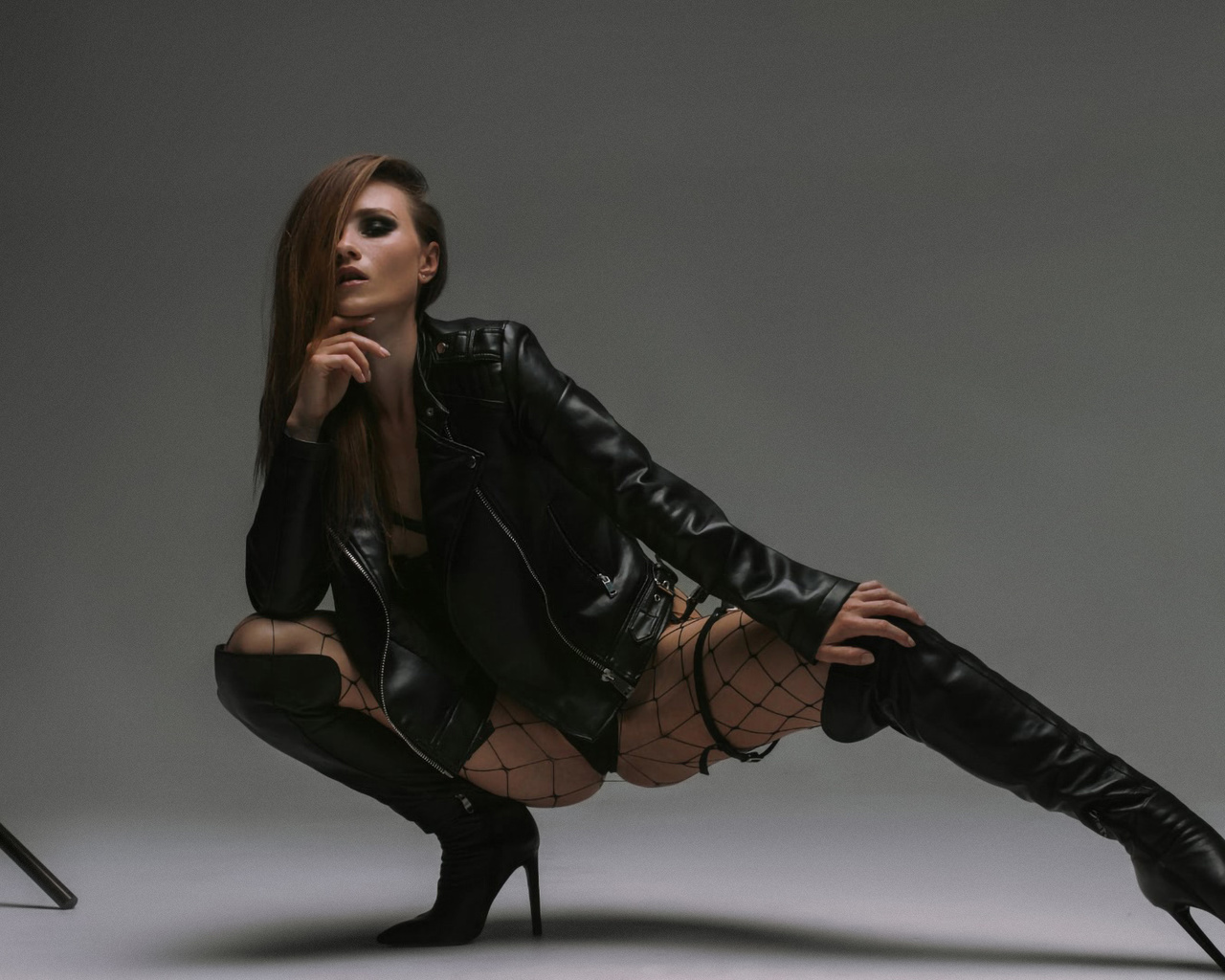 studio, ornella igoshina, bodysuit, , ass, squatting, leather jacket, brunette, boots, high heeled boots, women indoors, women, jacket, black bodysuit, model