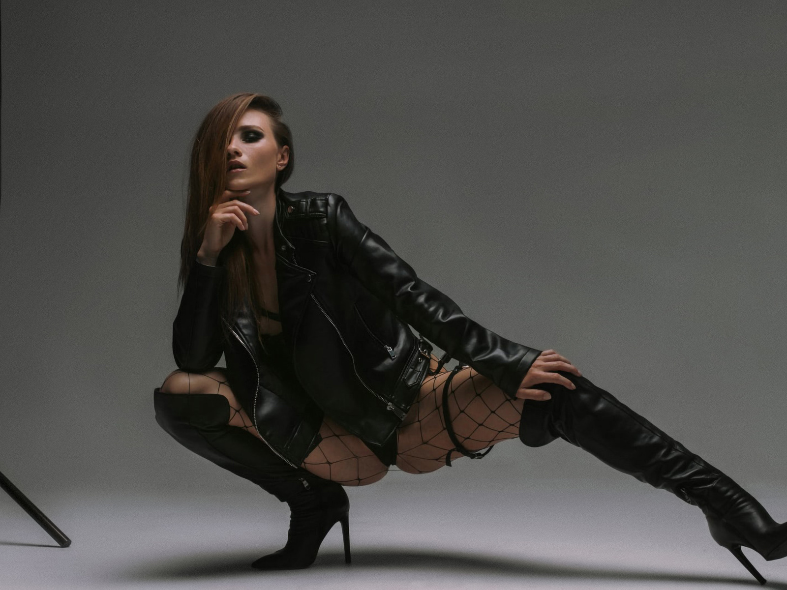 studio, ornella igoshina, bodysuit, , ass, squatting, leather jacket, brunette, boots, high heeled boots, women indoors, women, jacket, black bodysuit, model