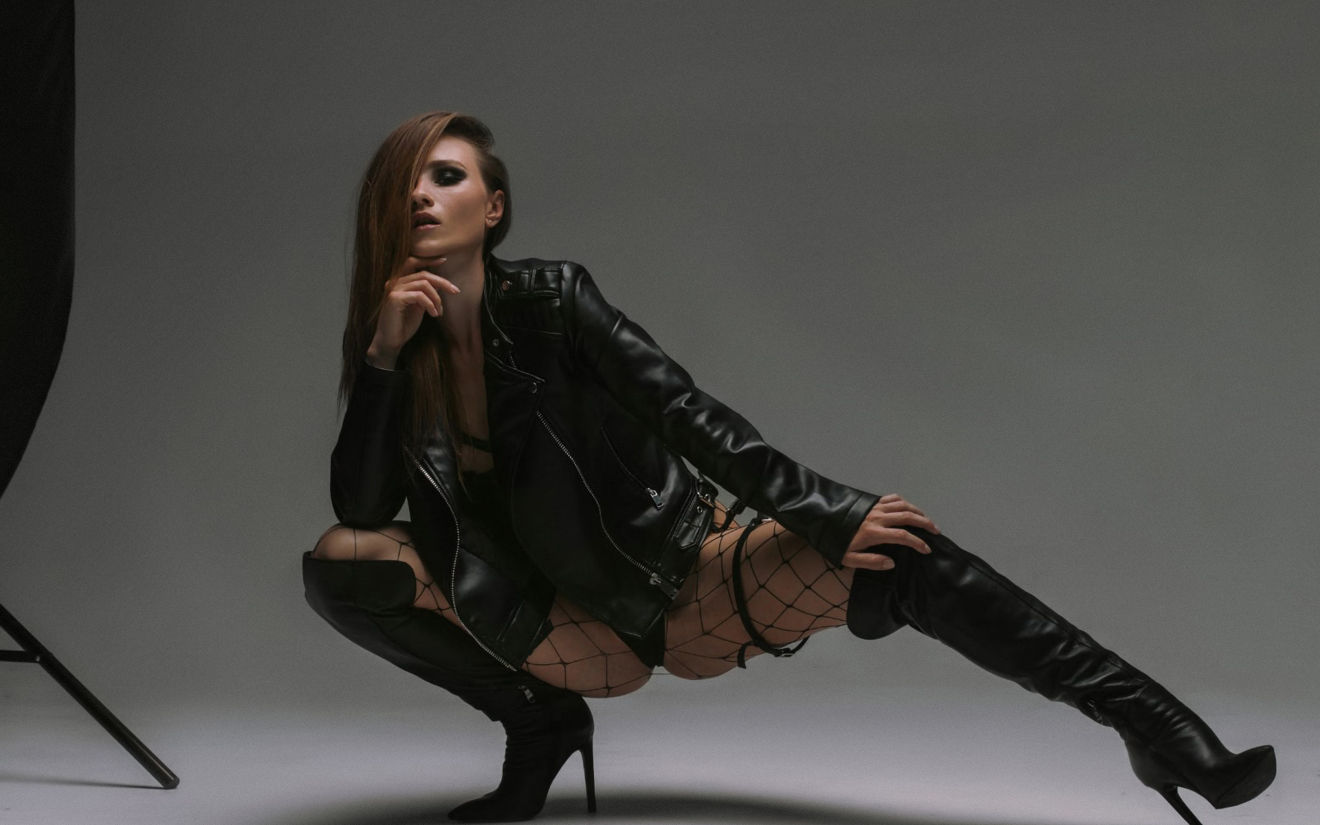 studio, ornella igoshina, bodysuit, , ass, squatting, leather jacket, brunette, boots, high heeled boots, women indoors, women, jacket, black bodysuit, model